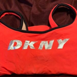 DKNY Ladies one piece orange swimsuit. Size S